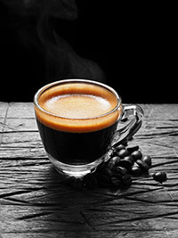 Glasstasse mit Inhalt Glastasse